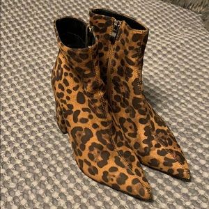 Zippered cheetah print heeled booties